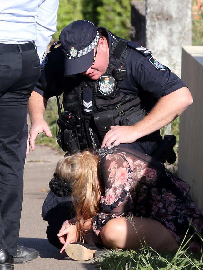 People leaving the Melbourne Cup Day at Eagle Farm. Picture: AAP/Richard Gosling