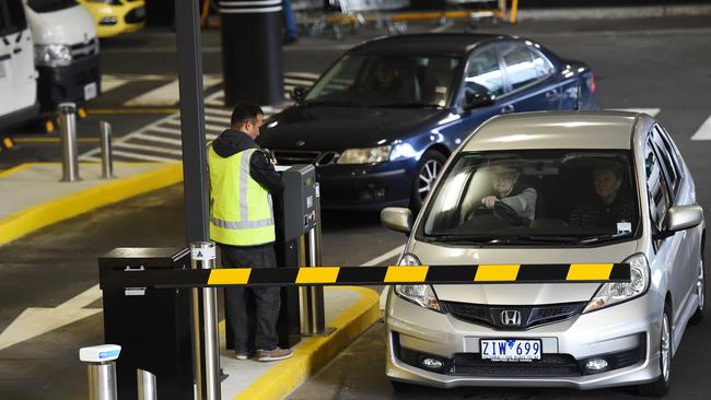 Shoppers leave Eastland through the new boom gates. Picture: Steve Tanner