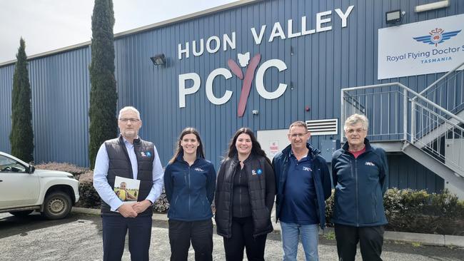 From left, Anglicare Tasmania General Manager Housing and Community Services Noel Mundy, Huon Valley PCYC Manager Bianca Jackman, Dimity Mika from Anglicare's Get into the Game program, Huon Valley PCYC President Steve Price and Huon Valley PCYC Committee member Rick Mills. (Supplied)