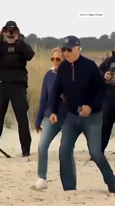 Joe Biden has hard time walking on sand