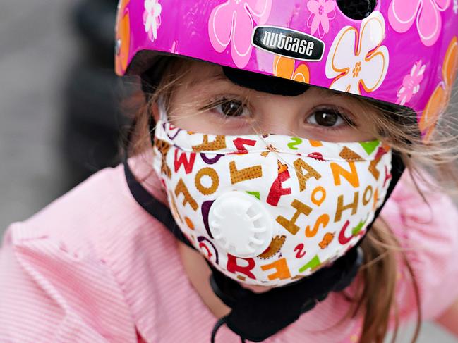 NEW YORK, NEW YORK - MAY 15:  A child wearing a protective mask waits outside Lenox Hill Hospital to show gratitude to the medical staff during the coronavirus pandemic on May 15, 2020 in New York City. COVID-19 has spread to most countries around the world, claiming over 308,000 lives with over 4.6 million infections reported. (Photo by Cindy Ord/Getty Images)