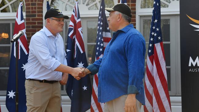 Prime Minister Scott Morrison and Australia's Ambassador to the US Joe Hockey speak at a garden party at the Ambassador's residence in Washington DC.