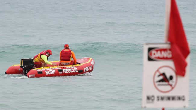 Burleigh Heads Surf Life Savers, pictured patrolling the area and scaring off four Sharks that had come near the swimming area. Picture: Mike Batterham