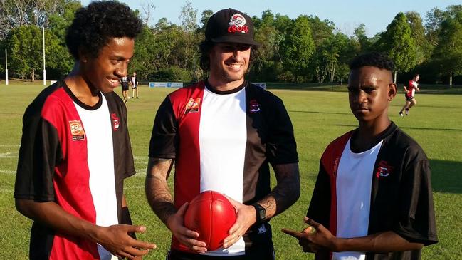 Districts coach Matt Cannard, seen here in a development role with Kitione Kanalagi and Steven Tipungwuti, has always supported rising juniors.