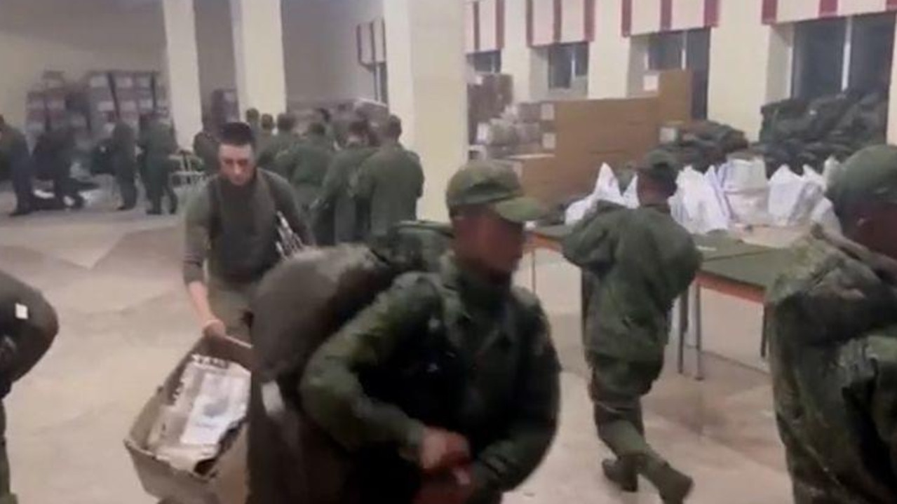 North Korean soldiers receive uniforms and equipment at a Russian army training base. Picture: Ukrainian Centre for Strategic Communication and Information Security