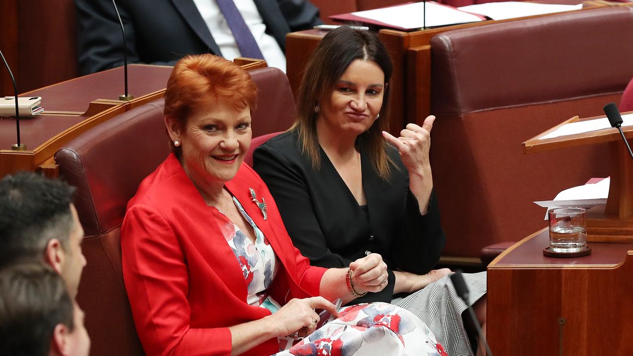 Senator Hanson with Senator Jacqui Lambie in the Senate Chamber. Picture: Kym Smith.