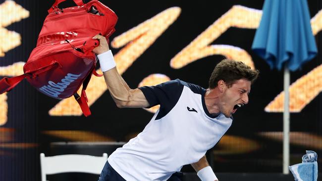 Pablo Carreno Busta throws his bag in anger. Picture: Getty Images