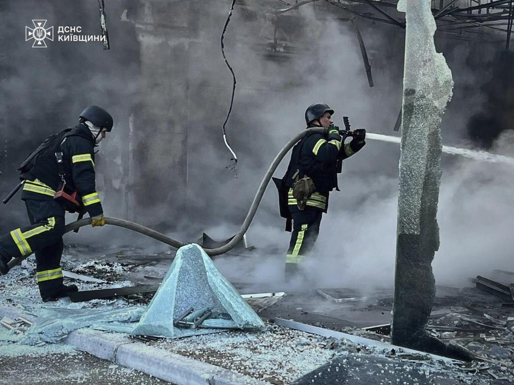 Firefighters put out the fire following Russia's drone attack in the Kyiv region, Ukraine, Sunday, May 18, 2025. Picture: Ukrainian Emergency Service via AP