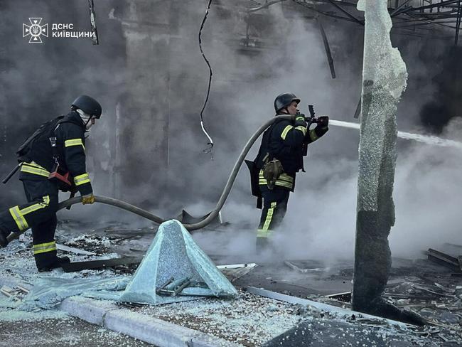 Firefighters put out the fire following Russia's drone attack in the Kyiv region, Ukraine, Sunday, May 18, 2025. Picture: Ukrainian Emergency Service via AP
