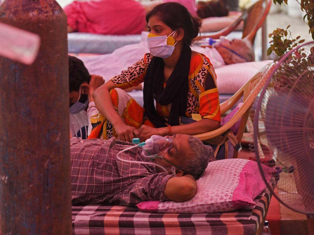 A patient is given oxygen at a Gurudwara, a place of worship for Sikhs, under a roadside tent on the outskirts of New Delhi on May 10. Picture: Arun Sankar / AFP