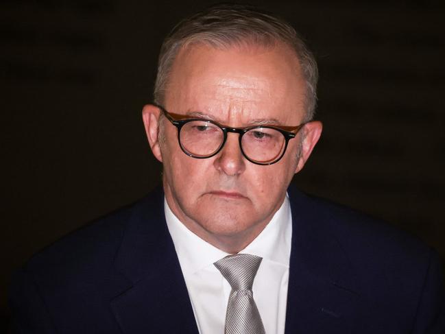 Australia's Prime Minister Anthony Albanese reacts as he listens to questions during a press conference at the Sydney Jewish Museum in Sydney on December 11, 2024. Albanese in a statement on social media said "I stand with the Jewish community and unequivocally condemn this attack", after vandals daubed anti-Israel graffiti in a Sydney suburb on December 11, days after a Melbourne synagogue was set ablaze. (Photo by DAVID GRAY / AFP)