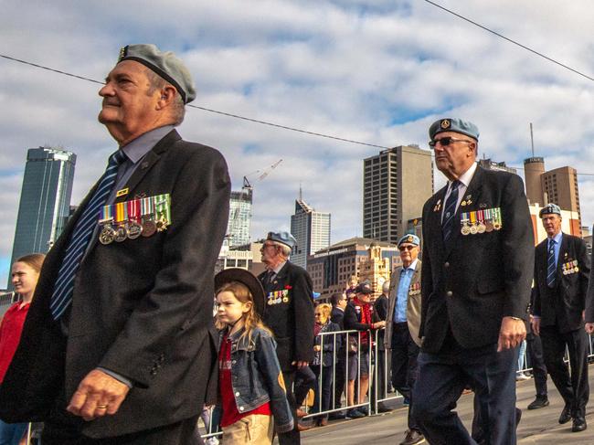 ANZAC Day March down Melbourne's St Kilda rd past Flinders Street Station to the Shrine of Remembrance. Picture: Jason Edwards