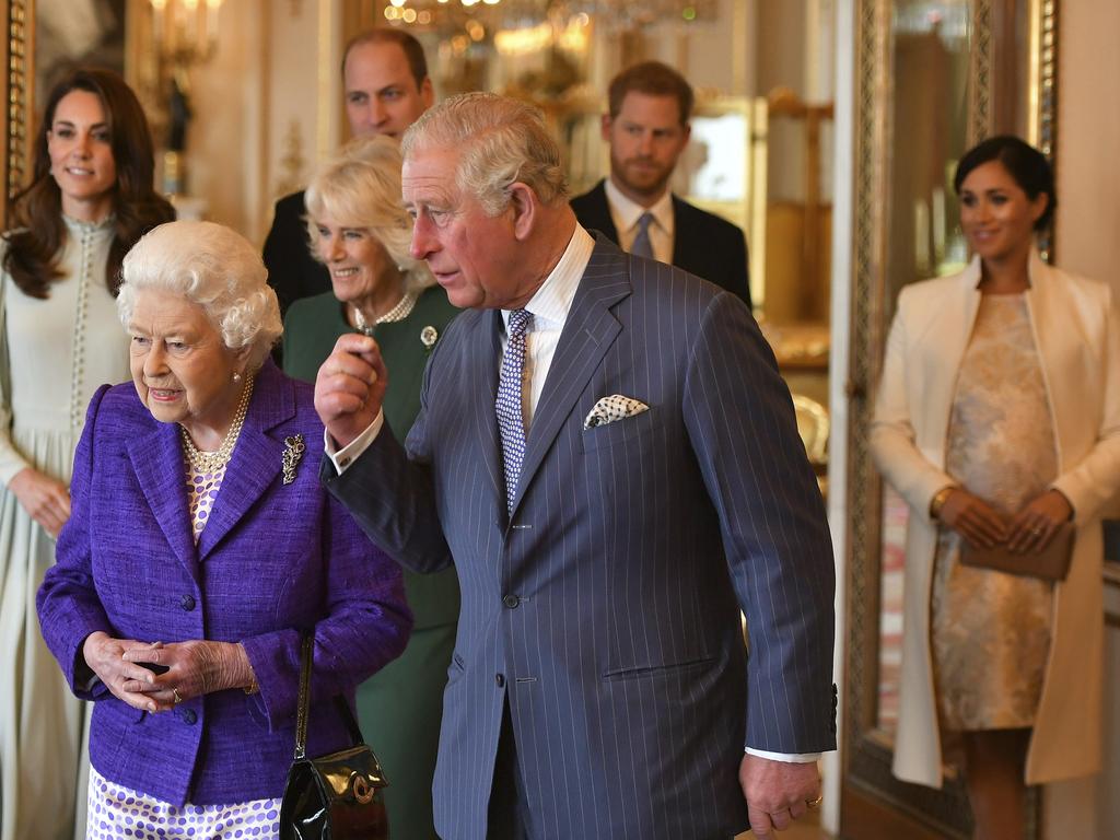 Britain's Queen Elizabeth II wore purple to the event, a colour of which she is fond. Picture: Dominic Lipinski/Pool via AP