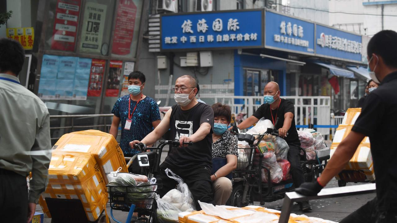 Beijing’s largest seafood and produce market was shuttered and surrounding neighbourhoods were placed into lockdown over the weekend. Picture: Greg Baker/AFP