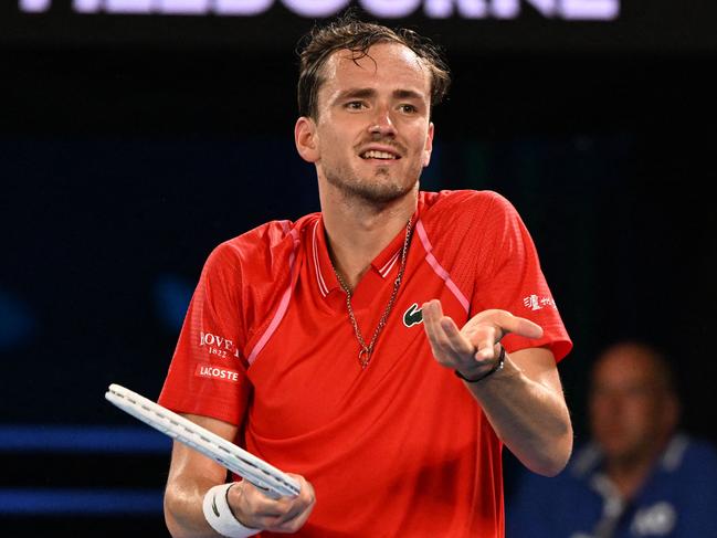 Russia's Daniil Medvedev reacts as he plays against Marcos Giron of the US during their men's singles match on day one of the Australian Open tennis tournament in Melbourne on January 16, 2023. (Photo by WILLIAM WEST / AFP) / -- IMAGE RESTRICTED TO EDITORIAL USE - STRICTLY NO COMMERCIAL USE --