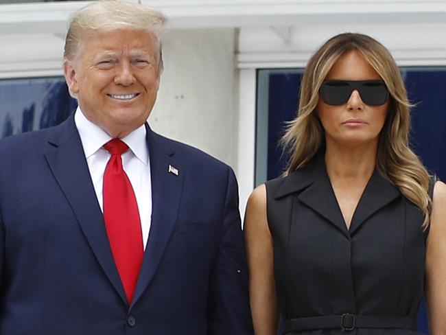 President Donald Trump and first lady Melania Trump visit Saint John Paul II National Shrine, Tuesday, June 2, 2020, in Washington. (AP Photo/Patrick Semansky)