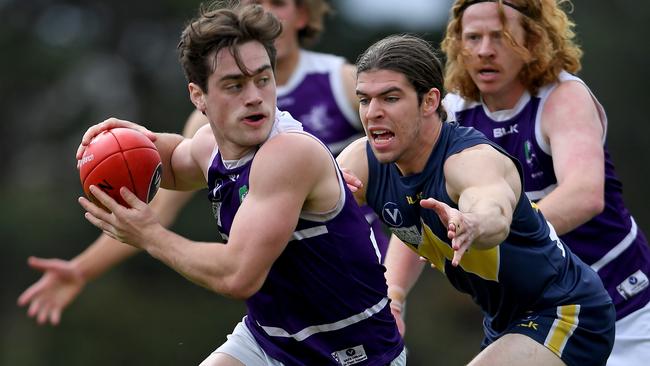 Luka Vlassopoulos and James Perrin in action during the VAFA (Div 2) Grand Final between Whitefriars and Brunswick in Box Hill, Sunday, Sept. 15, 2019. Picture: Andy Brownbill