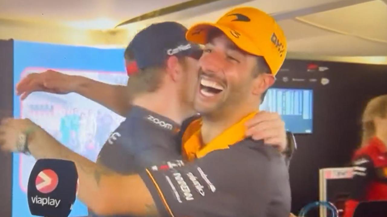 Daniel Ricciardo and Max Verstappen hug it out.