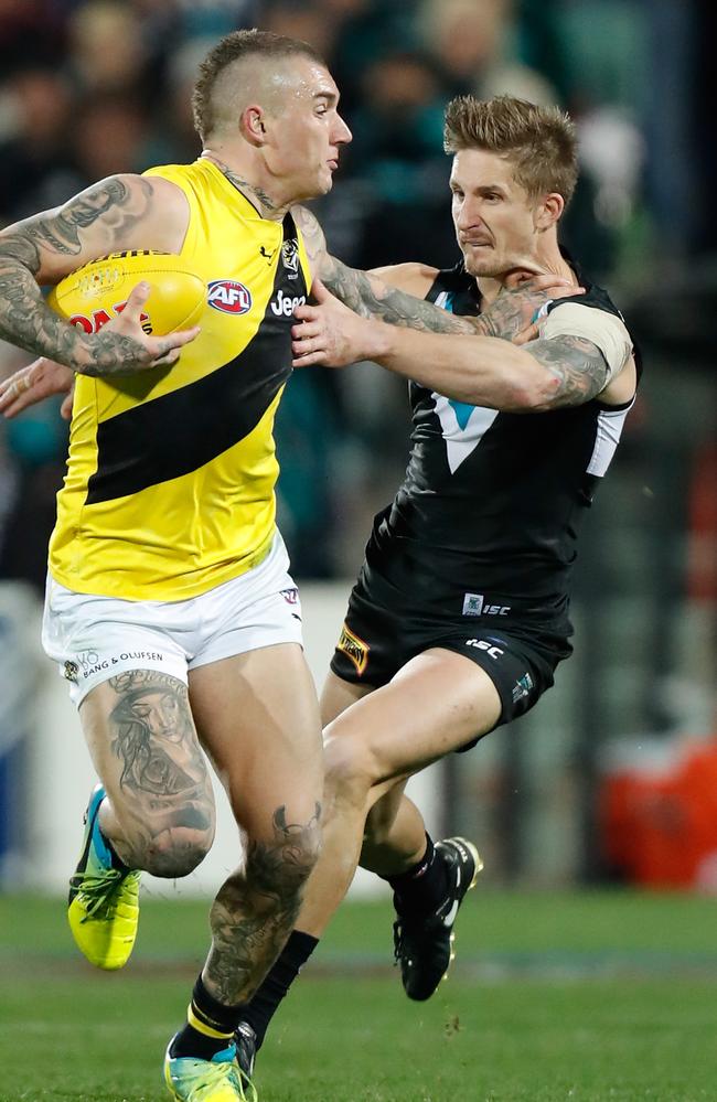 Dustin Martin gives Hamish Hartlett his famed ‘don’t-argue’ during Richmond’s game against Port Adelaide in Round 15. Picture: Getty