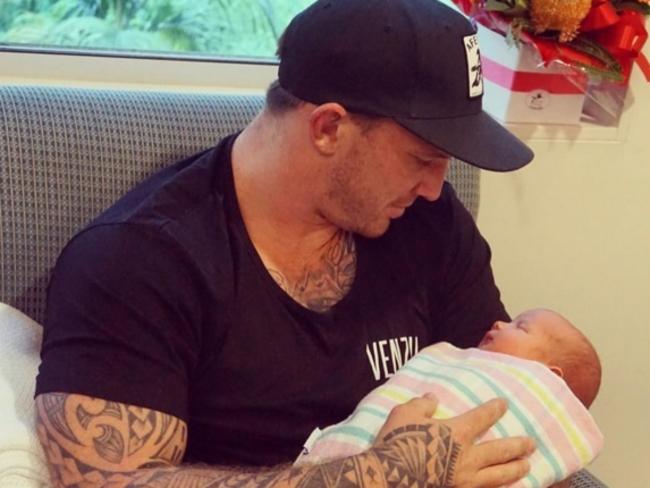 Josh McGuire and new born son Maxon.