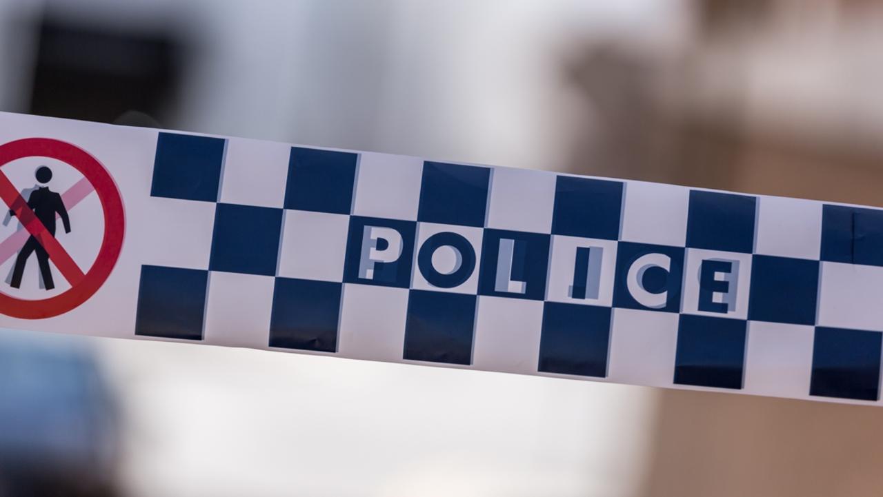 Car crashes into suburban business as driver flees scene