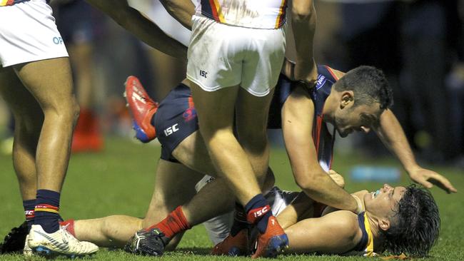 A rare moment at The Parade on Friday night when the Redlegs had Crows youngster Ned McHenry under control. Picture Dean Martin