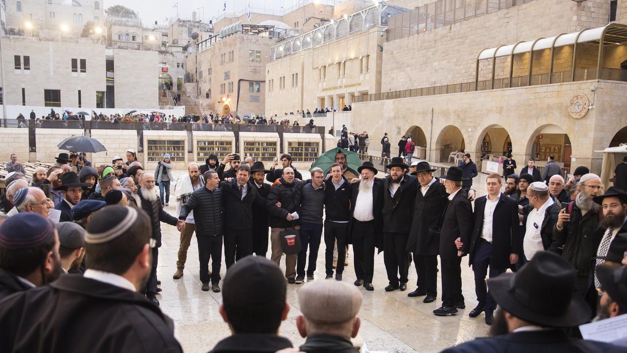 Jewish Orthodox men gather during a mass prayer at the Western Wall for coronavirus patients in Jerusalem’s Old City on February 16, 2020. Picture: Amir Levy/Getty Images