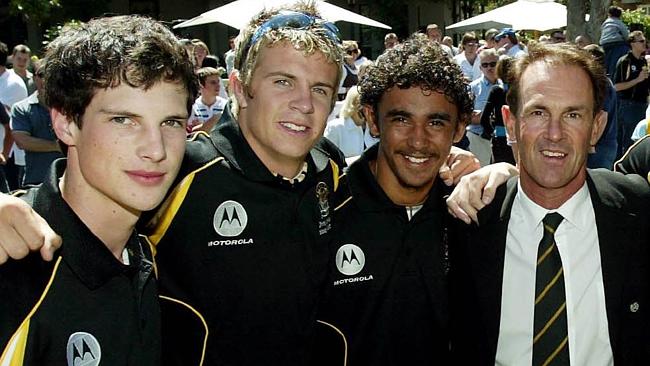 Some of Richmond’s 2004 draft picks — Danny Meyer, Brett Deledio and Richard Tambling with coach Terry Wallace.