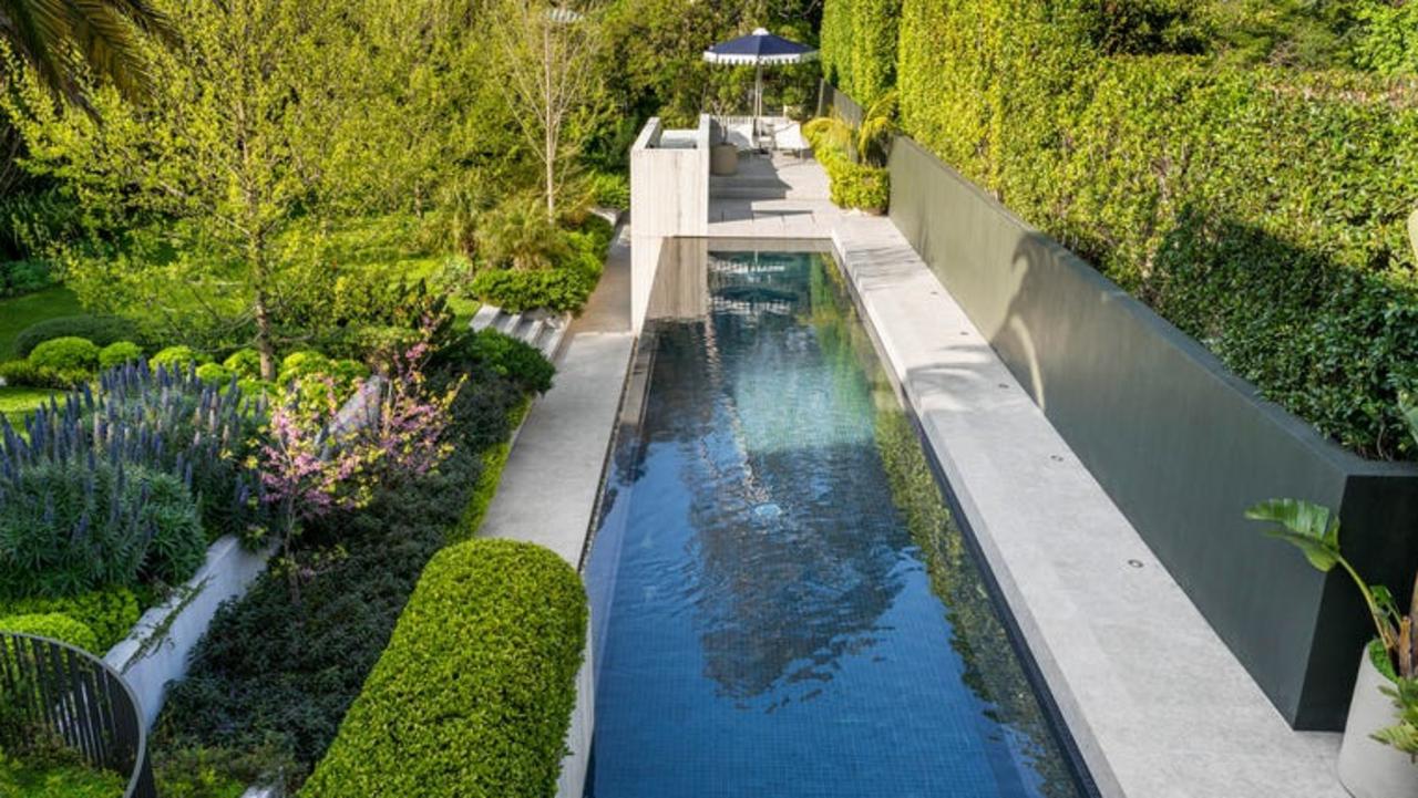 An impressive swimming pool and gardens are the product of designers at Eckersley.