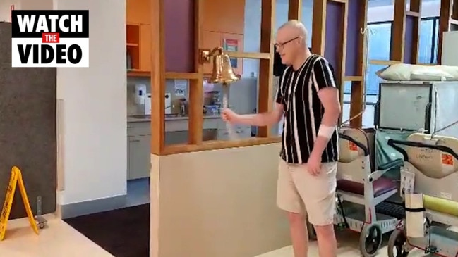 Jacob McLucas ringing the cancer celebration bell