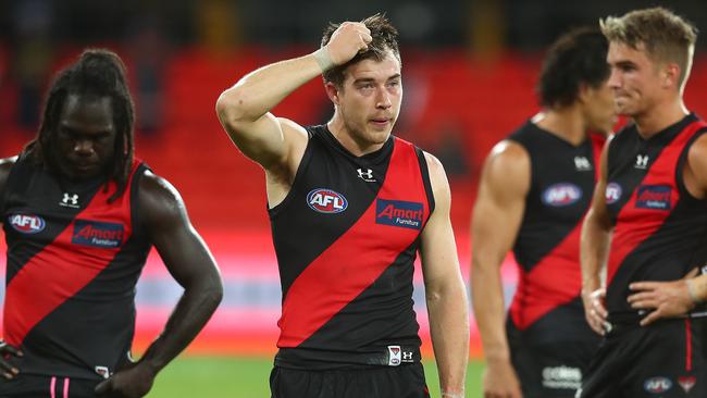 GOLD COAST, AUSTRALIA – AUGUST 07: Zach Merrett of the Bombers looks dejected after losing the round 10 AFL match between the Essendon Bombers and the Greater Western Sydney Giants at Metricon Stadium on August 07, 2020 in Gold Coast, Australia. (Photo by Chris Hyde/Getty Images)