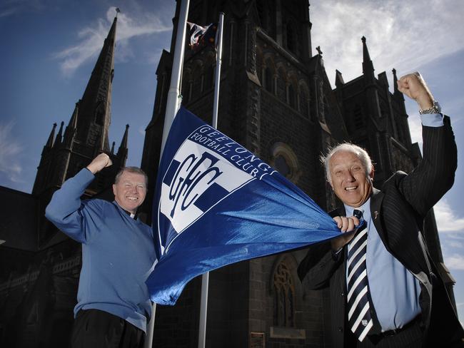 Father Kevin Dillon of St Mary's Basilica Geelong, and Frank Costa, President of the Geelong Football Club, hoist a Geelong flag, in 2007.