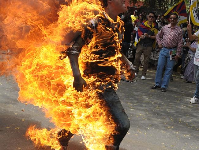 Tibetan activist Jhampel Yetshi is engulfed in flames at a protest in New Delhi, India, ahead of Chinese President Hu Jintao's visit in 2012. Photo: K Asif/India Today Group/Getty Images