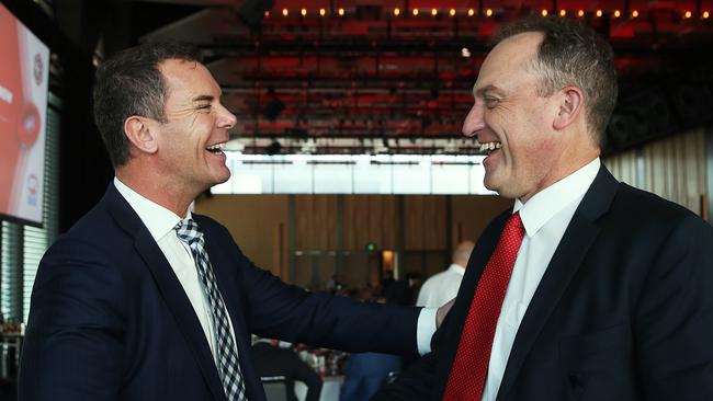 Wayne Carey and John Longmire at Thursday’s luncheon to celebrate the naming of the AFL Greatest Team in History. Picture. Phil Hillyard