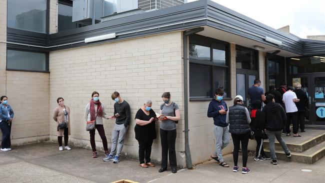 People were lining up around the block to get their Covid jabs at the Enfield Community Centre Clinic on Sunday. Picture Dean Martin