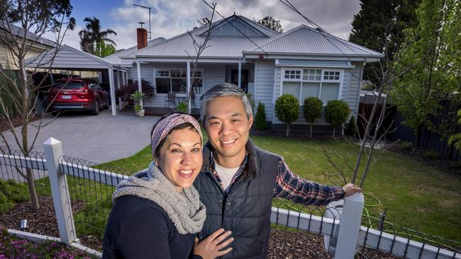 Lucy Scott and Darren Chan at the Blackburn North property they sold this year. Picture: David Geraghty