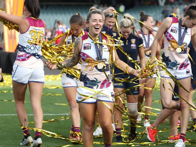 AFL Tasmania Hall of Fame inductee Jess Wuetschner celebrates Brisbane’s AFLW grand final win in 2021. (Photo by Sarah Reed/AFL Photos via Getty Images)