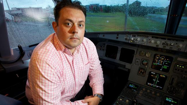 Strategic Airlines founder Michael James at Brisbane Airport with one of A320 planes in the fleet. Photographer: Liam Kidston.