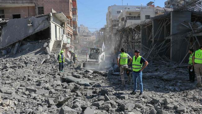 Emergency services clear the rubble from the site of an Israeli strike that targeted the southern Lebanese city of Tyre on Thursday. Picture: AFP