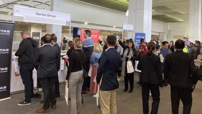 Jobseekers queue at Qantas stall during Sydney Airport jobs fair on Wednesday. Picture: Supplied