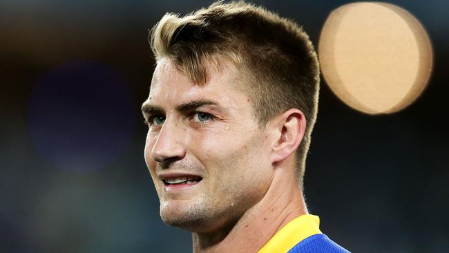 Kieran Foran is putting in a big effort across the ditch.