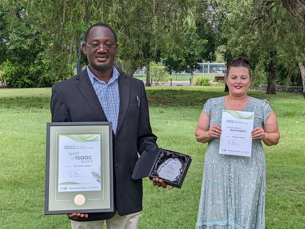 The Dysart Australia Day Awards 2022 Spirit of Isaac winner Dr Sunday Adebiyi with Isaac Regional Councillor Sandy Moffat. Picture: Contributed