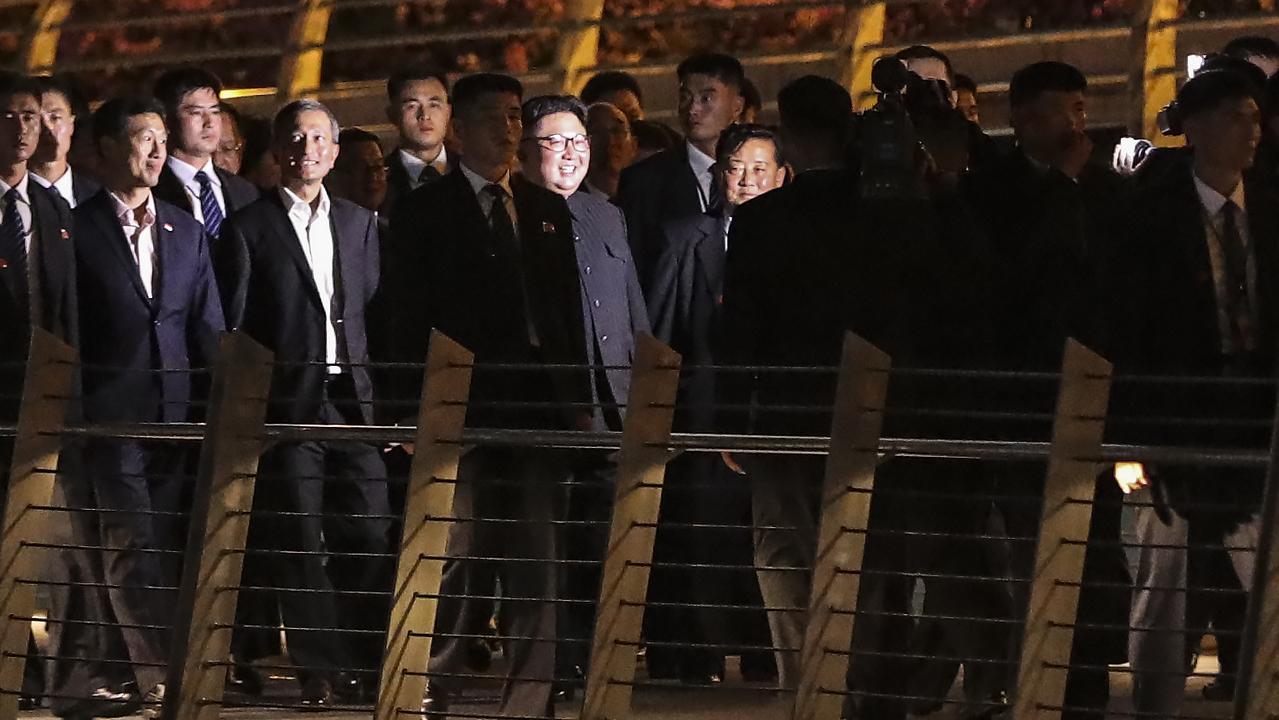 North Korea leader Kim Jong-un and his modest entourage taking a stroll in Singapore ahead of the summit.