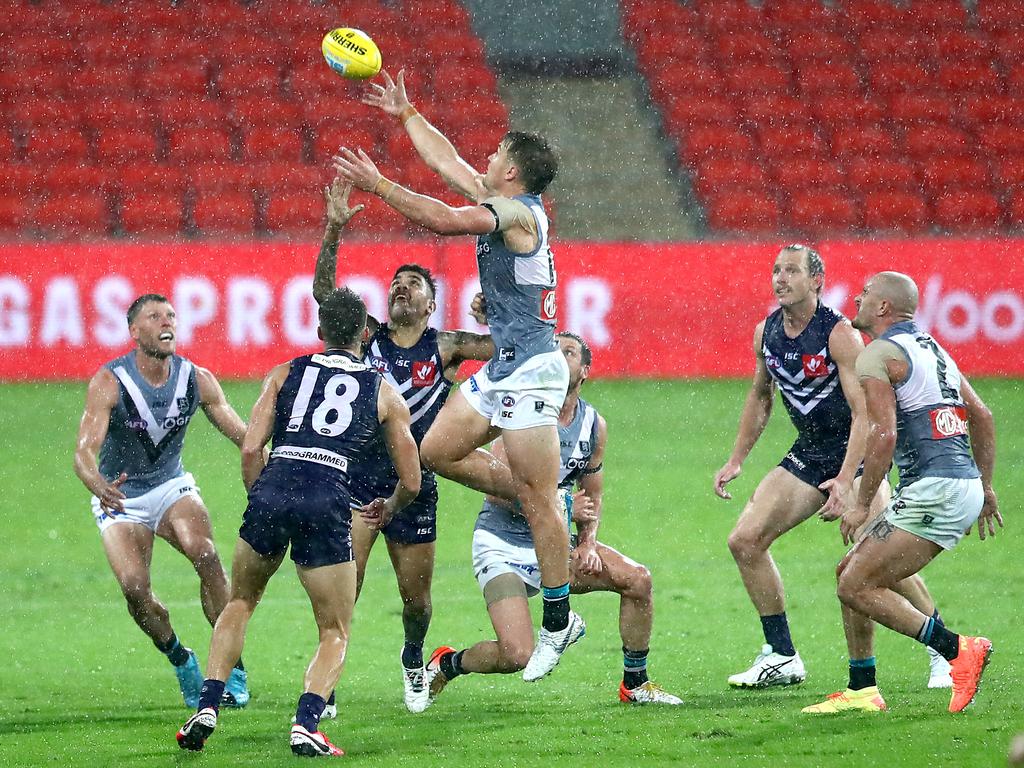 The Dockers may find their poor wet weather record exposed as rain continues to hammer the eastern states. Picture: Jono Searle/AFL Photos/via Getty Images