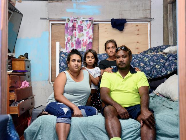 Davina and Colin Fourmile live with their daughters Selena and Alicia in one bedroom. Picture: Isaac McCarthy