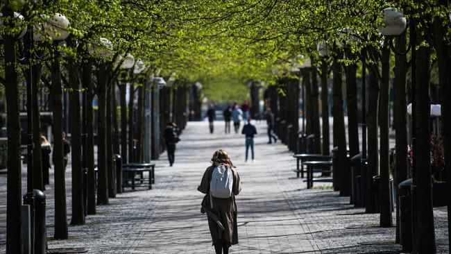 A woman walks through the Kungstradgarden in Stockholm. Picture: AFP