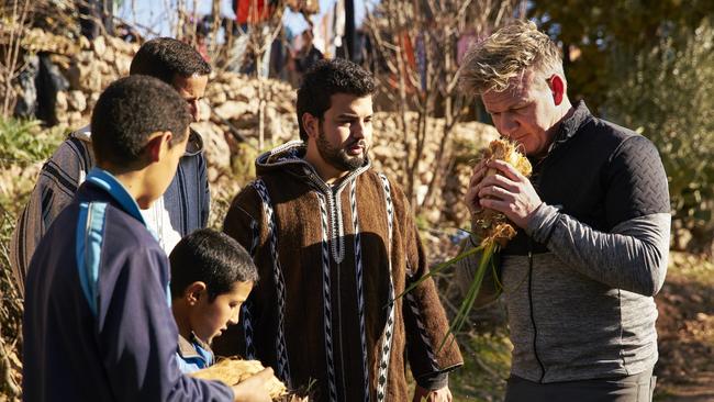 Gordon Ramsay stops during his journey to find local ingredients to sample hearts of palm sold by locals on the roadside. Picture: Mark Johnson/National Geographic/