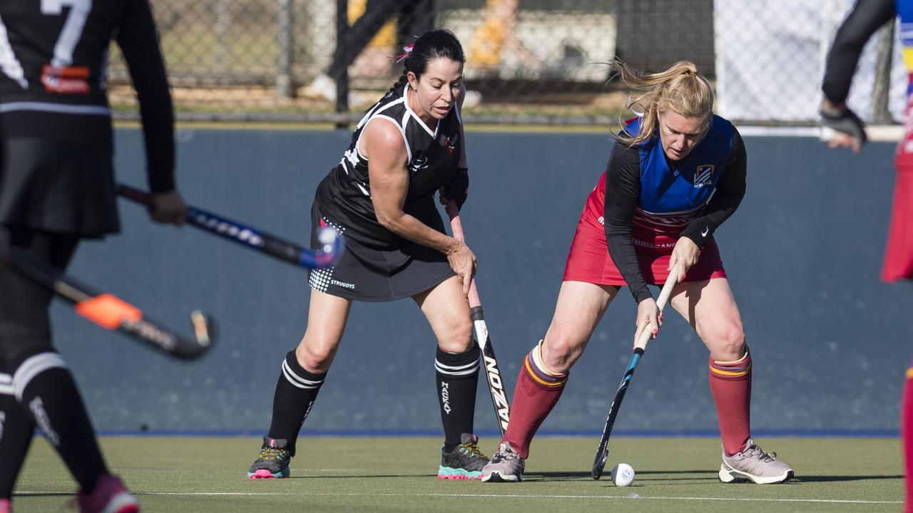 Catherine Pfingst (right) of Brisbane 2 and Karen Kidner of Mackay 1.