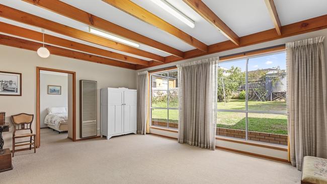 A previous extension adds an fourth bedroom and second living area to the home.