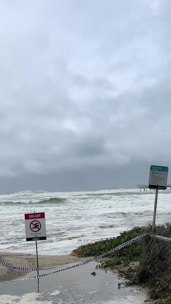 Swimmer pulled from raging waters during Tropical Cyclone Alfred